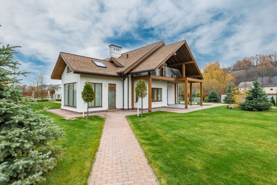 A beautiful house set in a green and peaceful garden.