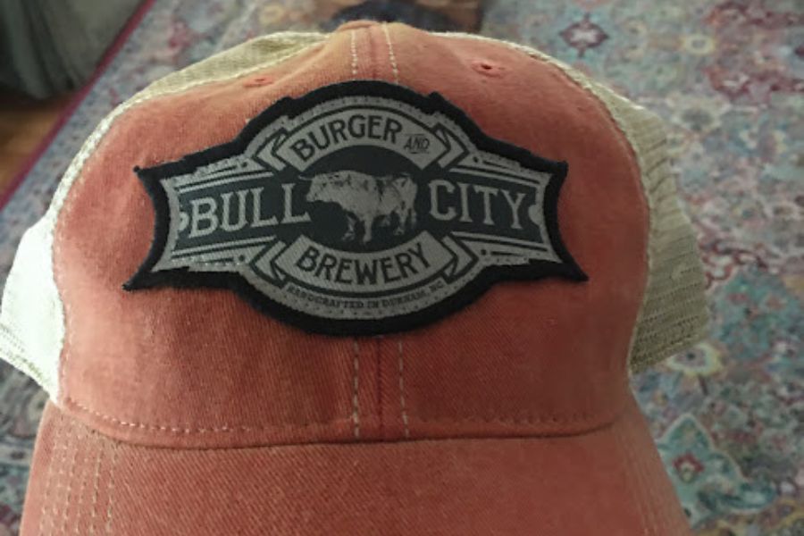 a basebeall cap displaying the name Bull City Burger and Brewery