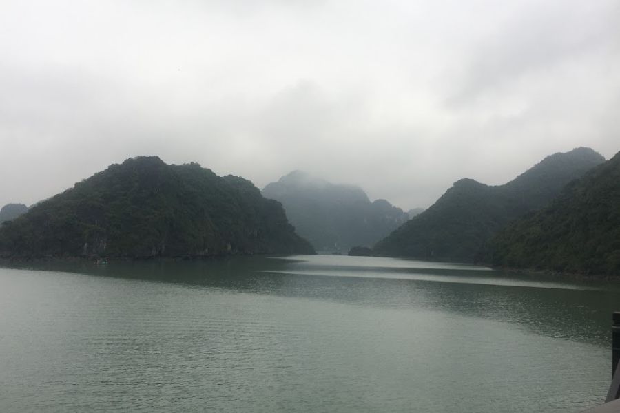 waterways and green rock formation in Ha Long Bay