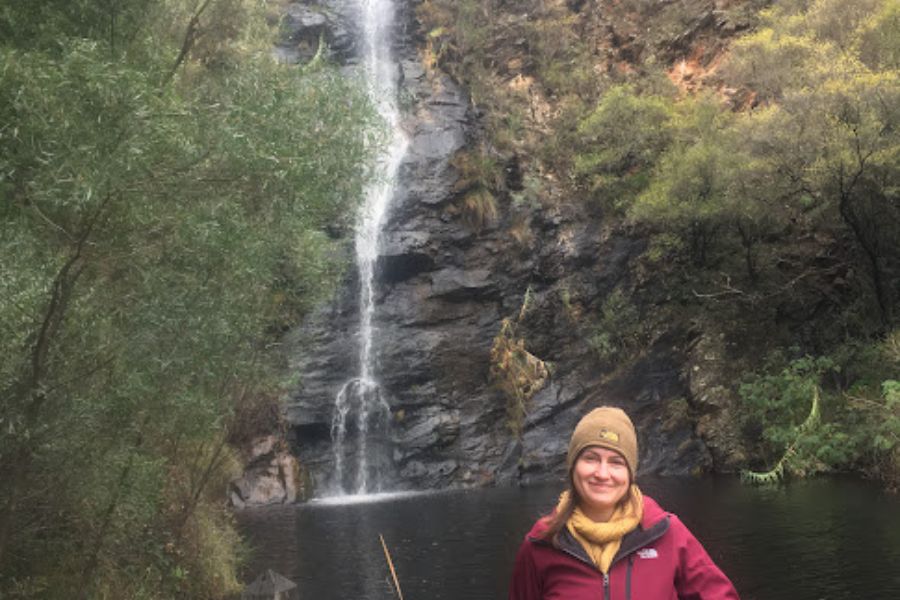 woman infront of waterfall