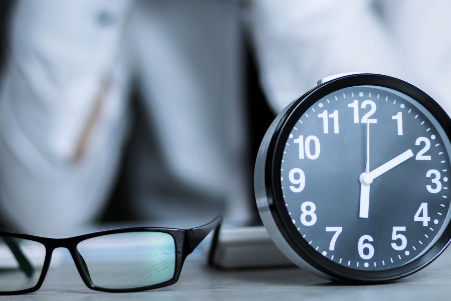 clock and eye glasses