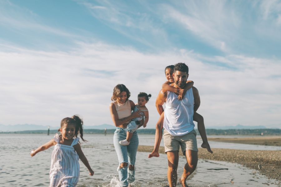 family of 5 on the beach