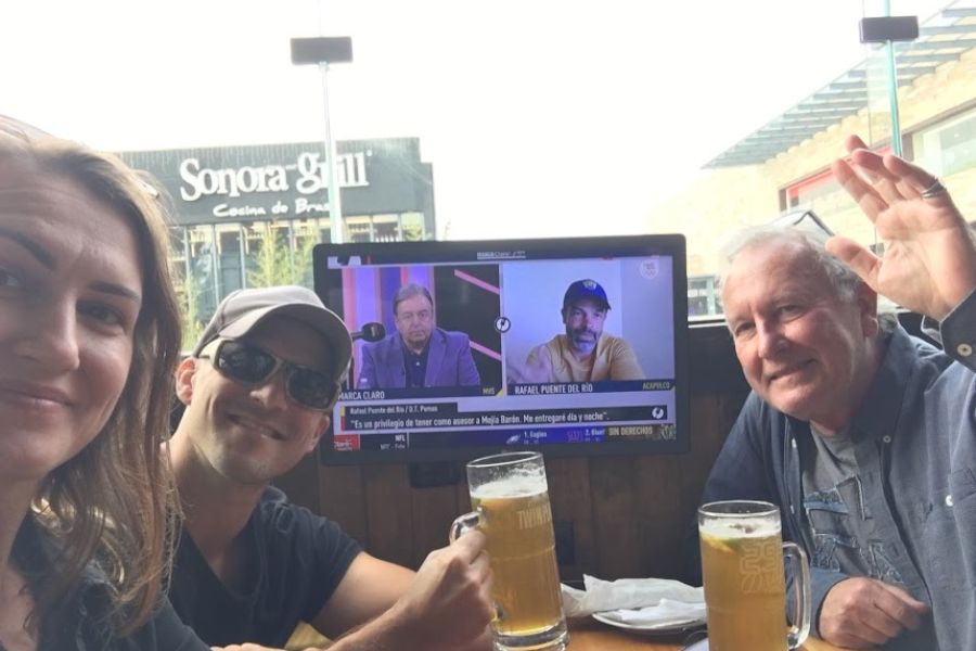 3 people drinking beers