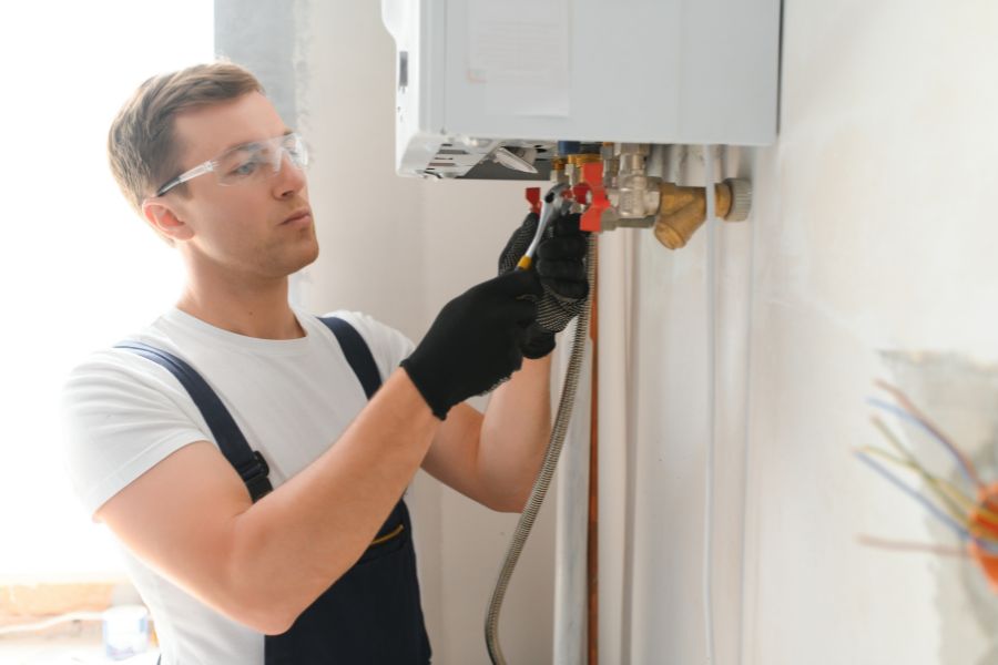 Plumber working on a boiler