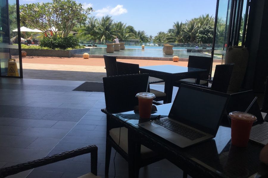 laptops by the pool