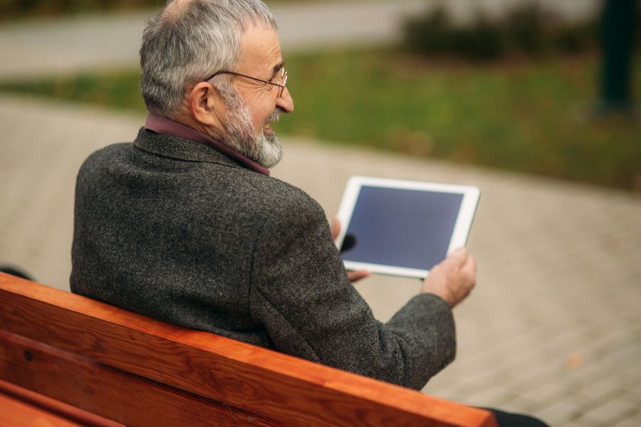 man with iPad