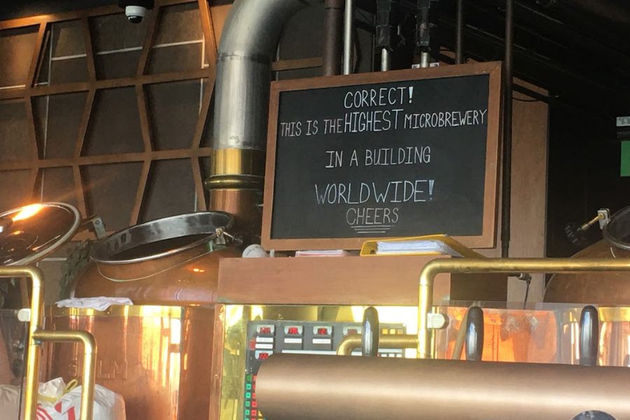 Bar sign reads highest micro brewery in the world 