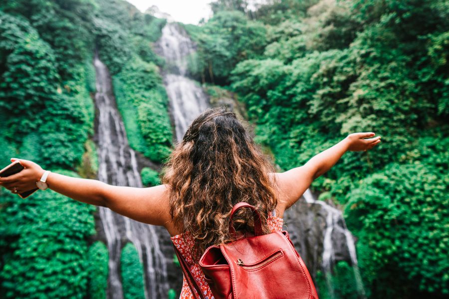 woman at waterfall